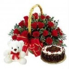 Basket of 12 roses with Black Forest cake and stuffed animal